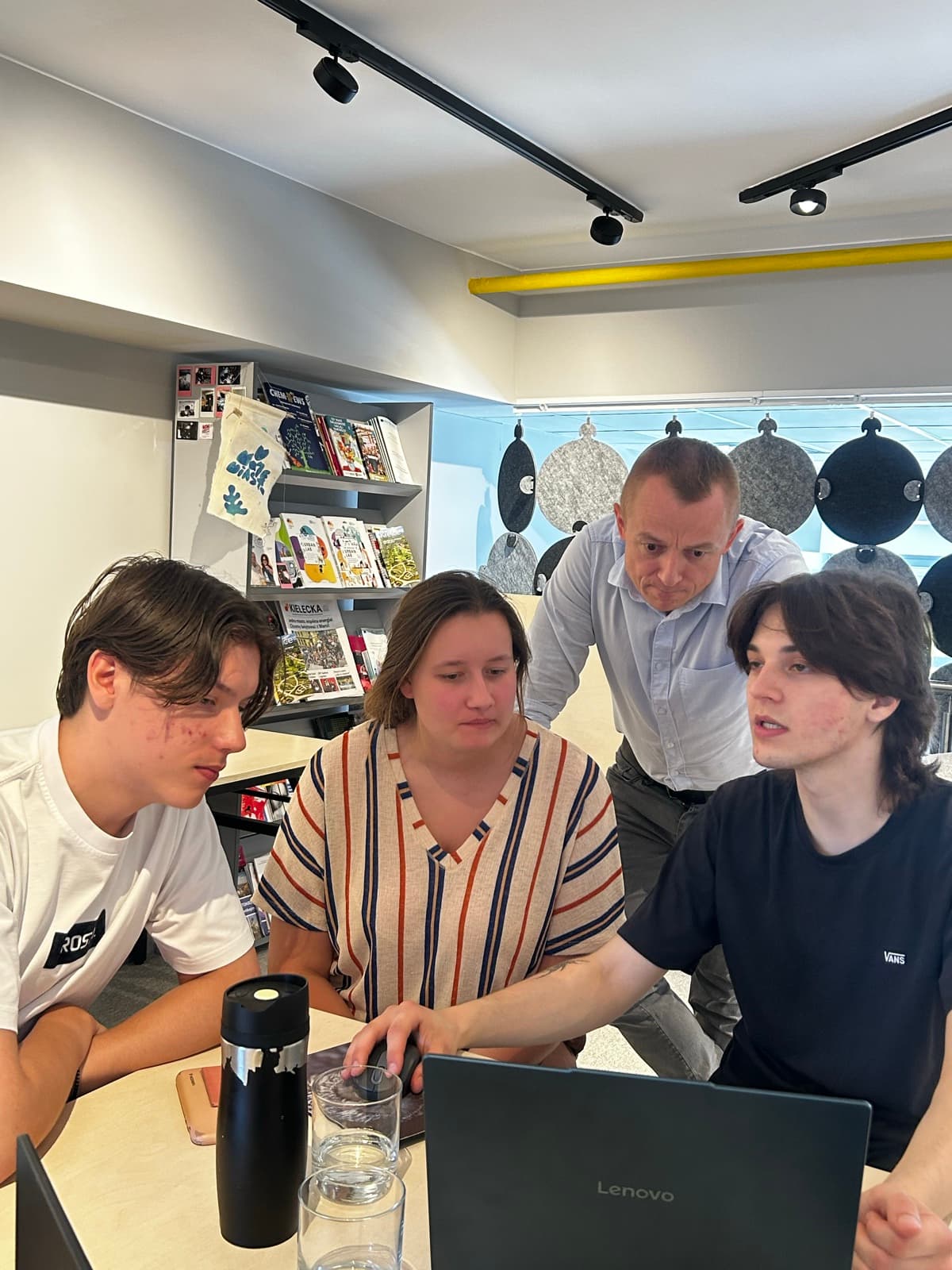 Prompting workshop at IdeaLab in Kielce — participants working at a laptop
