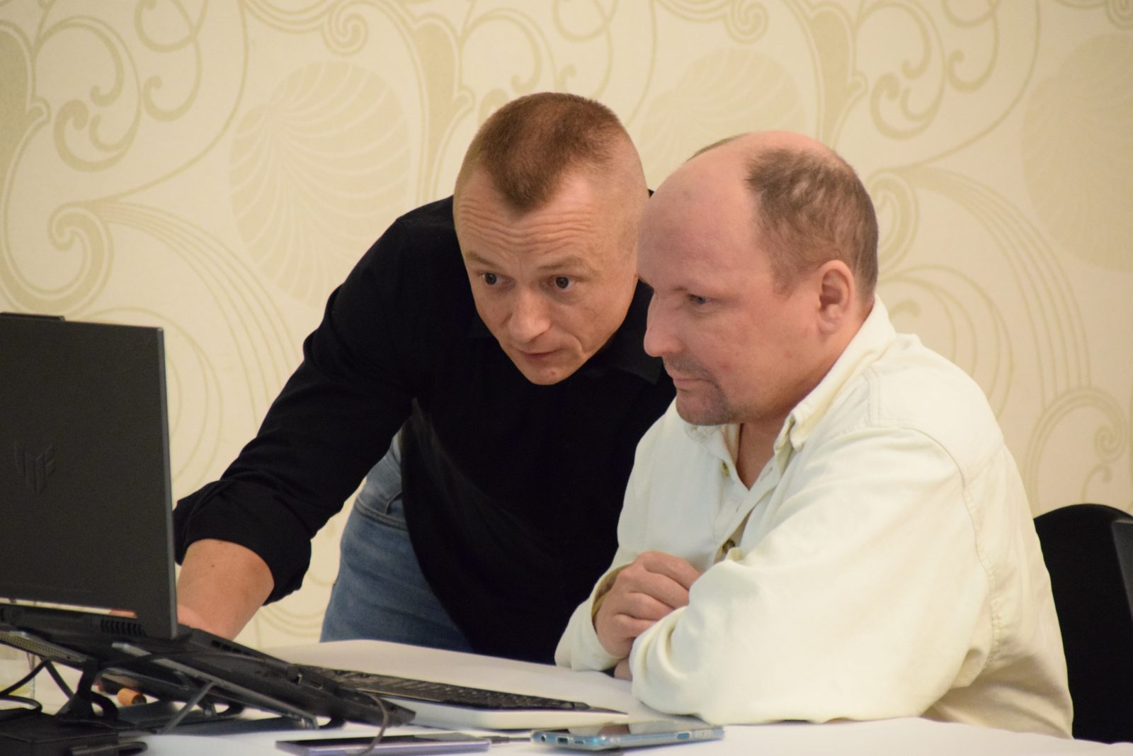 Debugging together at a laptop
